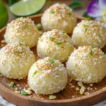 Hawaiian keto coconut macadamia fat bombs with toasted coconut and lime zest